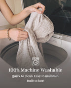 Person holding a sofa cover with text about machine washability in front of a washing machine.