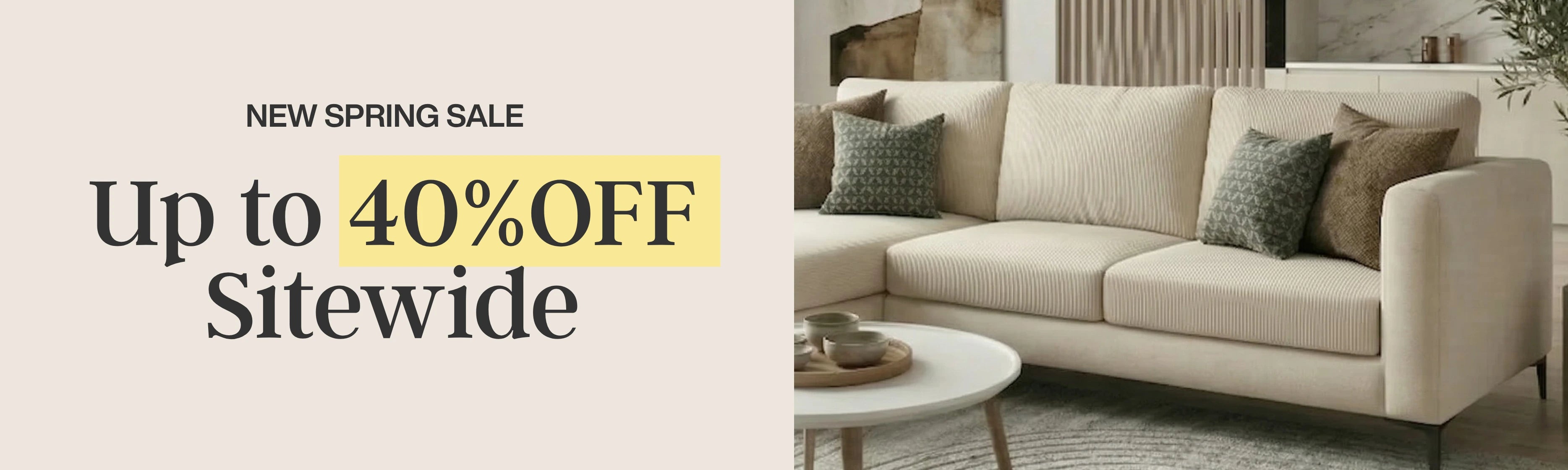 Beige sofa with decorative pillows in a living room setting, promotional banner for a 40% off sitewide sale.